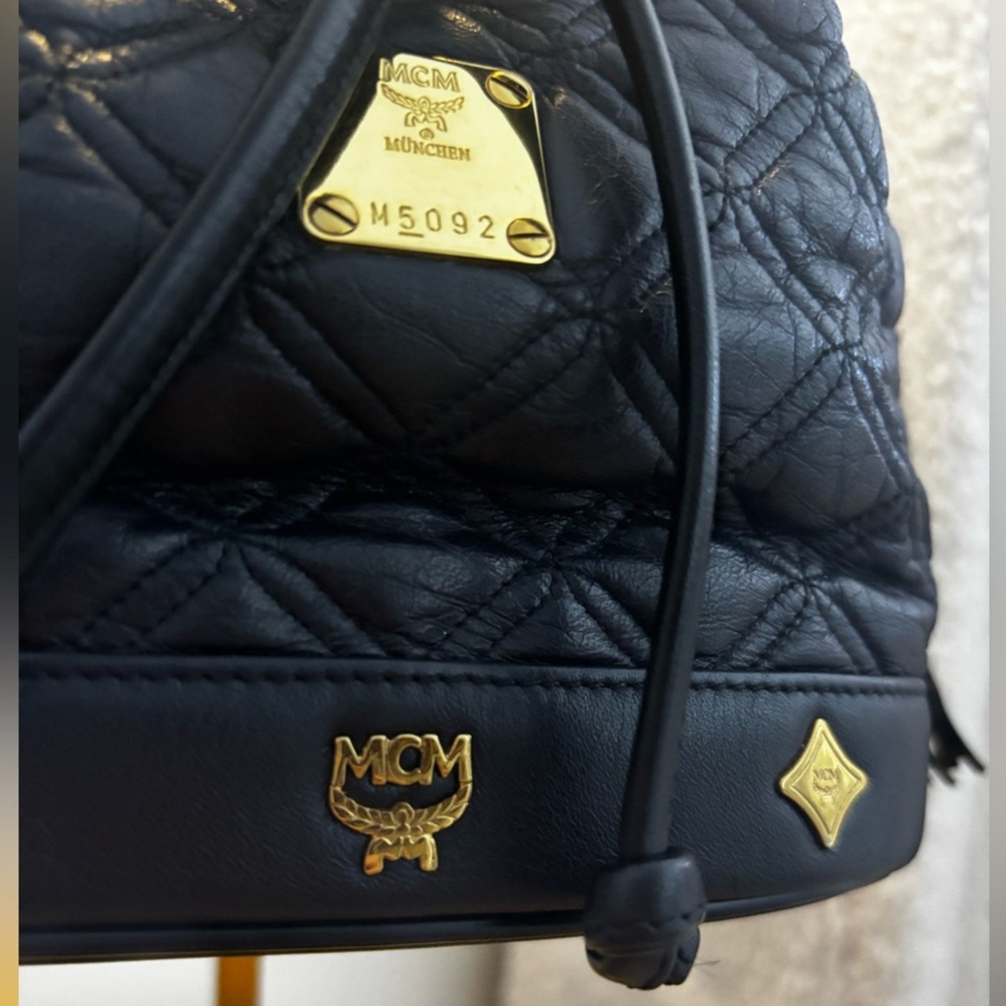 MCM Black Leather Tassel Bucket Bag