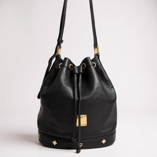 MCM Black Leather Drawstring Bucket Bag Visetos Logo Gold Hardware Shoulder Bag